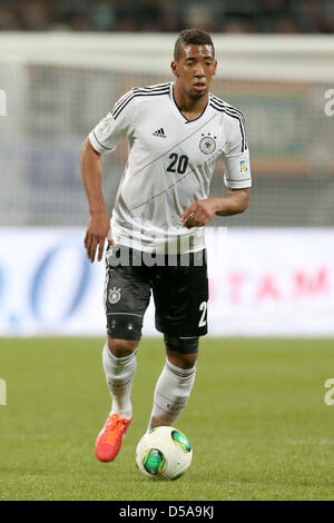 Germany's Jerome Boateng plays the ball during the FIFA World Cup 2014 qualification group C soccer match between Germany and Kazakhstan at Nuernberg Arena in Nuremberg, Germany, 26 March 2013. Photo: Daniel Karmann/dpa Stock Photo