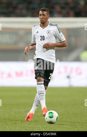 Germany's Jerome Boateng plays the ball during the FIFA World Cup 2014 qualification group C soccer match between Germany and Kazakhstan at Nuernberg Arena in Nuremberg, Germany, 26 March 2013. Photo: Daniel Karmann/dpa Stock Photo