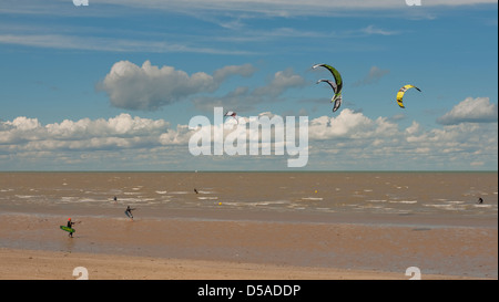 Kite surfers on the beach at Minnis Bay, birchington kent. Stock Photo