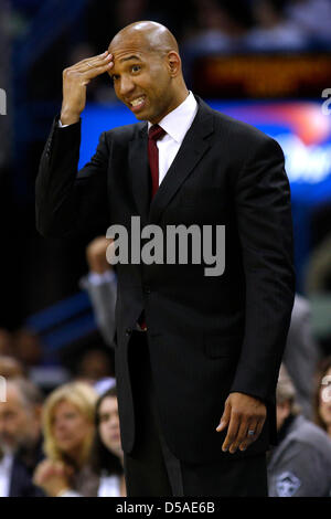 March 25, 2013 - New Orleans, Louisiana, United States of America - March 26, 2013: New Orleans Hornets head coach Monty Williams reacts during the NBA basketball game between the New Orleans Hornets and the Denver Nuggets at the New Orleans Arena in New Orleans, LA. Stock Photo