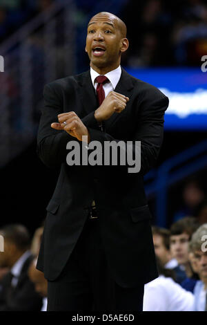 March 25, 2013 - New Orleans, Louisiana, United States of America - March 26, 2013: New Orleans Hornets head coach Monty Williams reacts during the NBA basketball game between the New Orleans Hornets and the Denver Nuggets at the New Orleans Arena in New Orleans, LA. Stock Photo