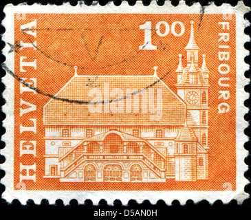 SWITZERLAND - CIRCA 1960: A stamp printed in Switzerland shows Town hall, Fribourg, Switzerland, circa 1960  Stock Photo