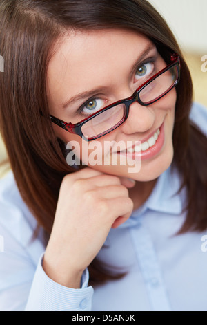 Close-up portrait of an office employee with a charming smile Stock Photo