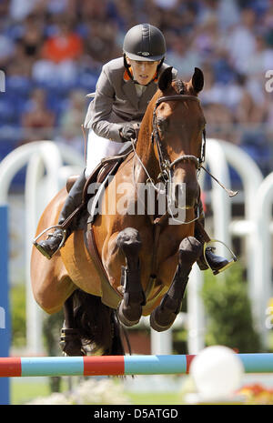 Germany's Meredith Michaels-Beerbaum and her horse 'Shutterfly' take an obstacle at the CHIO 2010 in Aachen, Germany, 14 July 2010. Photo: JOERG CARSTENSEN Stock Photo