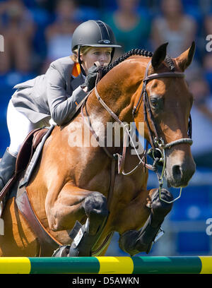 Germany's Meredith Michaels-Beerbaum and her horse 'Shutterfly' take an obstacle at the CHIO 2010 in Aachen, Germany, 14 July 2010. Photo: Uwe Anspach Stock Photo