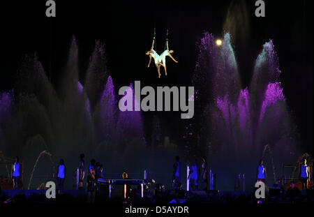 A colourful spectacle is presented during the opening ceremony of European Athletics Championships Barcelona 2010 in Barcelona, Spain, 26 July 2010. The European Athletics Championships Barcelona 2010 are held from 27 July to 01 August with 1,370 athletes from all 50 EAA member states participating. Photo: Rainer Jensen Stock Photo