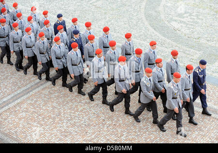 Some 650 German Bundeswehr recruits stand attention during their public ...