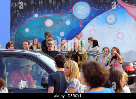 Cast member and US actor Adam Sandler arrives by car for the premiere of his film 'Grown Ups' at the 'O2 World Arena' in Berlin, Germany, 30 July 2010. The film is in German cinemas from 05 August on. Photo: Jens Kalaene Stock Photo