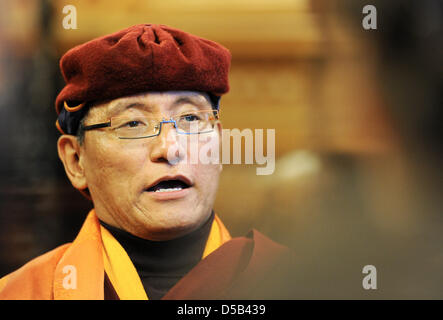 Spiritual head of Tibetan Drukpa-order, his holyness the 12. Gyalwang Drukpa, talks with a journalist in Hamburg, Germany, 05 January 2010. Mayor Beust (CDU) greeted the buddhist dignitary in city hall. Afterwards, the student of the Dalai Lama wanted to sign the city's golden book. The Drupka-order is one of the Tibetan buddhist schools and a state religion in Bhutan. Worldwide, a Stock Photo