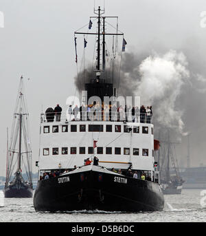 Steam ice-breaker 'Stettin' participates in the squadron sail at 20th Hanse Sail festival in Rostock, Germany, 07 August 2010. A total of 242 traditional boats and museum ships from 13 nations announced their participation, organisers expect some one million visitors. Photo: BERND WUESTNECK Stock Photo