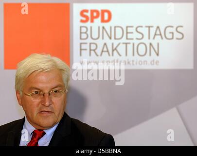 (file) - A dpa file picture dated 29 September 2009 shows the SPD's chairman of the parliamentary fraction Frank-Walter Steinmeier during a break of the constituent meeting of the parliamentary fraction in Berlin, Germany. On 23 August 2010, Steinmeier announced plans to 'retreat from the public sphere for a few weeks' to donate a kidney to his gravely ill wife. Photo: Tim Brakemei Stock Photo