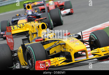 Polish formula one driver Robert Kubica (front) of Team Renault races in his car ahead of Australian driver Mark Webber of Team Red Bull during the Belgian Grand Prix at the Spa-Francorchamps Circuit in Spa-Francorchamps, Belgium, 29 August 2010. Photo: Peter Steffen Stock Photo