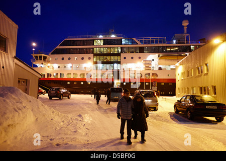 hurtigruten mv midnatsol ship calling at night in vardo finnmark norway europe Stock Photo