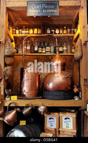 A small distillery is situated in the Whisky Museum in Kirn (district Bad Kreuznach), Germany, 5 August 2010. Museum owner Horst Kroll has gathered approxinately 3500 bottles and a cooper workshop in the museum in the Kyrburg. About 500 different types of whisky can be tasted in the vaulted cellar. Photo: Harald Tittel Stock Photo