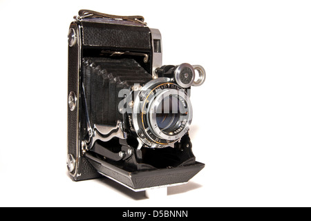 Old-time rusty photo-camera isolated on white background Stock Photo