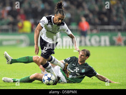 Werder Bremen faces Tottenham Hotspur in the Champions League Group A at the Weser Stadiun in Bremen, Germany, 14 September 2010. Bremen's Tim Borowski (R) vies for the ball with Tottenham's Benoit Assou-Ekotto. Photo: Ingo Wagner Stock Photo