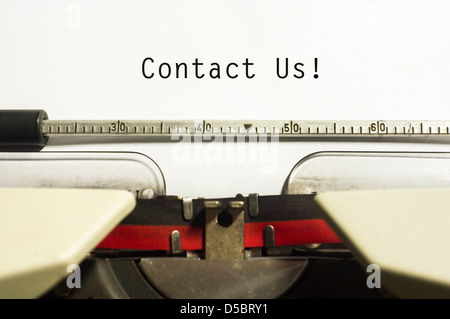 contact us concepts, with message on typewriter paper. Stock Photo