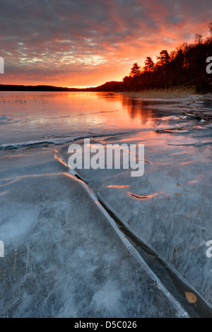 Sunrise over frozen lake Rådasjön, Mölndal, Sweden, Europe Stock Photo