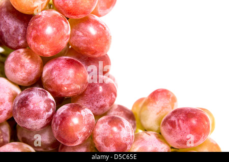 Red vine grape border close up, isolated on white background Stock Photo