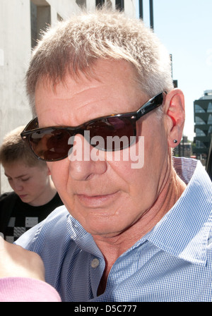 Harrison Ford signing autographs outside SAT.1 TV studios whilst promoting the new movie 'Cowboys & Aliens' in Germany Berlin, Stock Photo