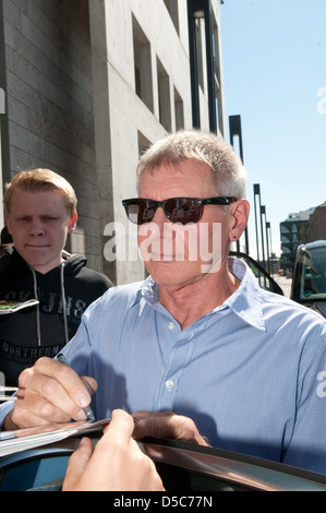 Harrison Ford signing autographs outside SAT.1 TV studios whilst promoting the new movie 'Cowboys & Aliens' in Germany Berlin, Stock Photo