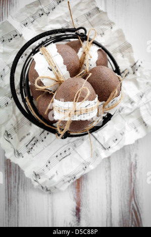 Brown easter eggs with musical notes and ribbon Stock Photo
