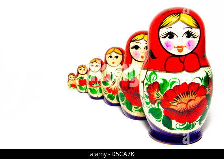 Russian Babushka nesting dolls in row, isolated on white background. Stock Photo