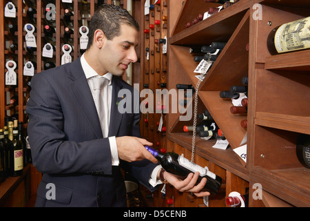 Sommelier or wine steward, Wine cellar, Xara Palace, boutique hotel, Mdina, Malta Stock Photo