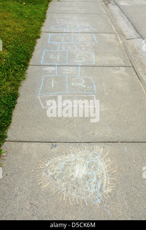 Hopscotch drawn on sidewalk, Hoonah, Alaska. Stock Photo