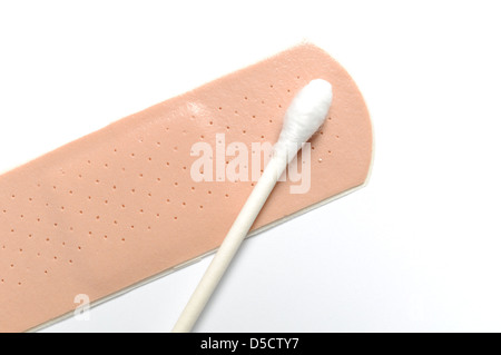 Adhesive bandage and cotton swab Stock Photo