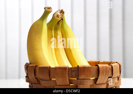 Bananas in a wicker basket Stock Photo