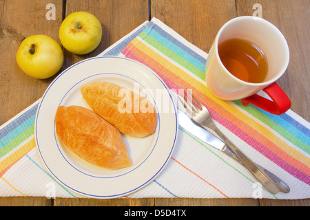 Homemade patties on the plate with juice and apples Stock Photo