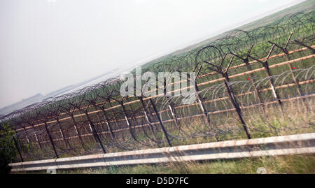 Photo shows the wire fencing that marks the start of the the demilitarized zone (DMZ) some 50 km north of Seoul, South Korea on 24 June 2010..Photographer: Rob Gilhooly . Stock Photo