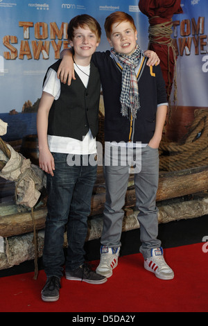 Louis Hofmann and Leon Seidel at the premiere of 'Tom Sawyer' at Kulturbrauerei movie theatre. Berlin, Germany - 06.11.2011 Stock Photo