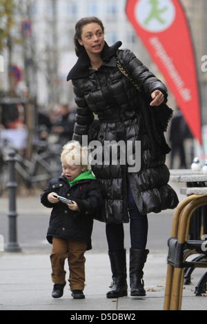 Lilly Becker walking with her son Amadeus near Friedrichstrasse in Mitte. Berlin, Germany - 09.11.2011 Stock Photo