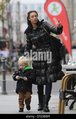 Lilly Becker walking with her son Amadeus near Friedrichstrasse in Mitte. Berlin, Germany - 09.11.2011 Stock Photo