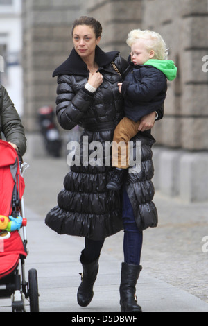 Lilly Becker walking with her son Amadeus near Friedrichstrasse in Mitte. Berlin, Germany - 09.11.2011 Stock Photo