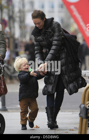 Lilly Becker walking with her son Amadeus near Friedrichstrasse in Mitte. Berlin, Germany - 09.11.2011 Stock Photo