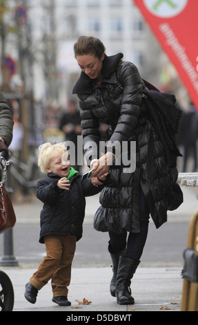 Lilly Becker walking with her son Amadeus near Friedrichstrasse in Mitte. Berlin, Germany Stock Photo