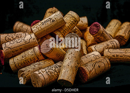 Dated wine corks on a black background Stock Photo