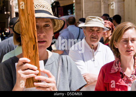 Jerusalem, Israel. 29th March 2013.  Thousands of Christians flock to the Church of The Holy Sepulchre on Good Friday. Jerusalem, Israel. 29-Mar-2013.  Thousands of Christian pilgrims retraced the last steps of Jesus through the Via Dolorosa to the Church of the Holy Sepulchre on Good Friday, singing and chanting in a mix of languages, costumes and traditions. Credit: Nir Alon / Alamy Live News Stock Photo