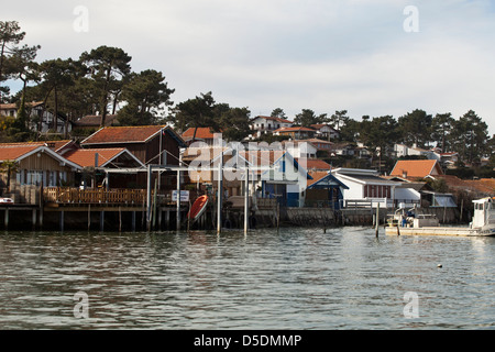 Small water front fisherman's huts in the village of Le Canon, Lège-Cap-Ferret, France Stock Photo