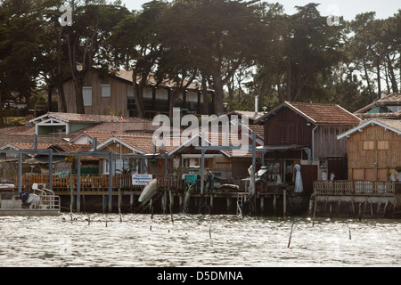 Small water front fisherman's huts in the village of Le Canon, Lège-Cap-Ferret, France Stock Photo