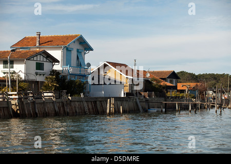 Small water front fisherman's huts in the village of Le Grand-Piquey, Lège-Cap-Ferret, France Stock Photo