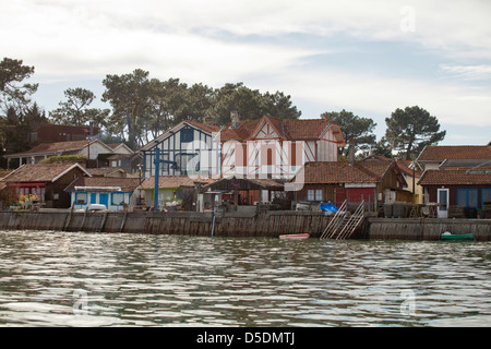 Small water front fisherman's huts in the village of Le Grand-Piquey, Lège-Cap-Ferret, France Stock Photo