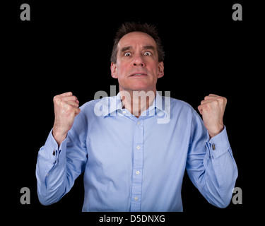 Frustrated Middle Age Business Man Shaking Fists in Anger Black Background Stock Photo