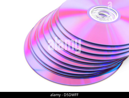 Stack of vibrant purple DVDs or CDs isolated on white background. No dust. Stock Photo