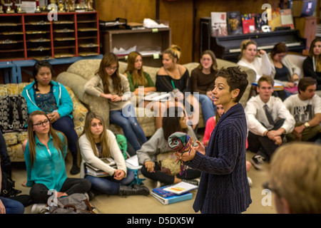 A high school drama teacher instructs her multiethnic students in San Clemente, CA. Stock Photo