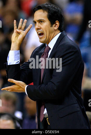 March 29, 2013 - New Orleans, Louisiana, United States of America - March 29, 2013: Miami Heat head coach Erik Spoelstra reacts during the NBA basketball game between the New Orleans Hornets and the Miami Heat at the New Orleans Arena in New Orleans, LA. Stock Photo