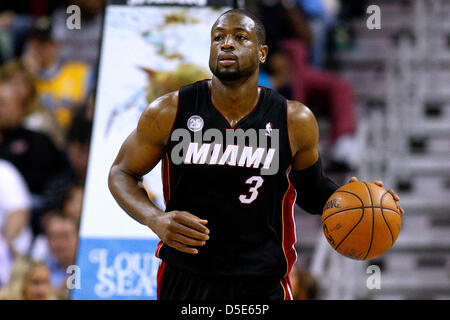 March 29, 2013 - New Orleans, Louisiana, United States of America - March 29, 2013: Miami Heat shooting guard Dwyane Wade (3) drives with the ball during the NBA basketball game between the New Orleans Hornets and the Miami Heat at the New Orleans Arena in New Orleans, LA. Stock Photo